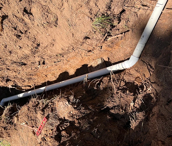Underground plumbing line repair in progress, illustrating trenchless repair techniques.